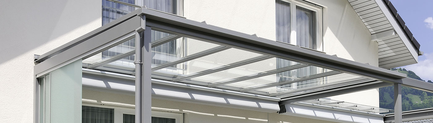 Le toit en verre comme protection contre les intempéries avec les normes de sécurité les plus élevées